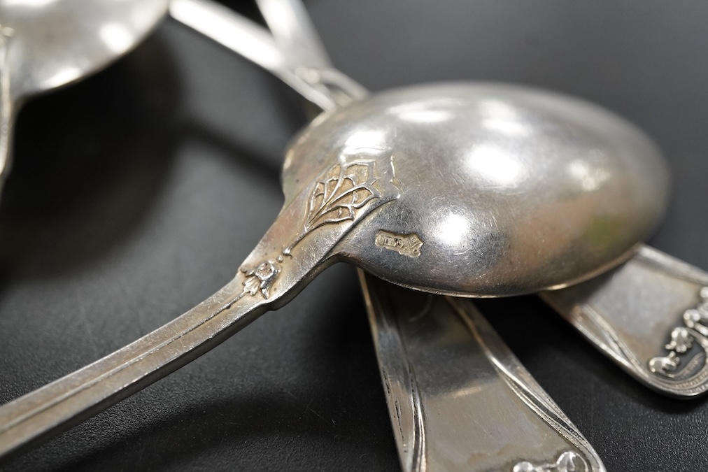 A set of eleven continental Art Nouveau .800 silver teaspoons length 14.8 cm., weight approx. 6.98ozt